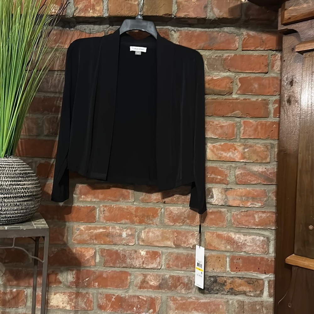 CALVIN KLEIN size medium , color black, with tags, never been worn